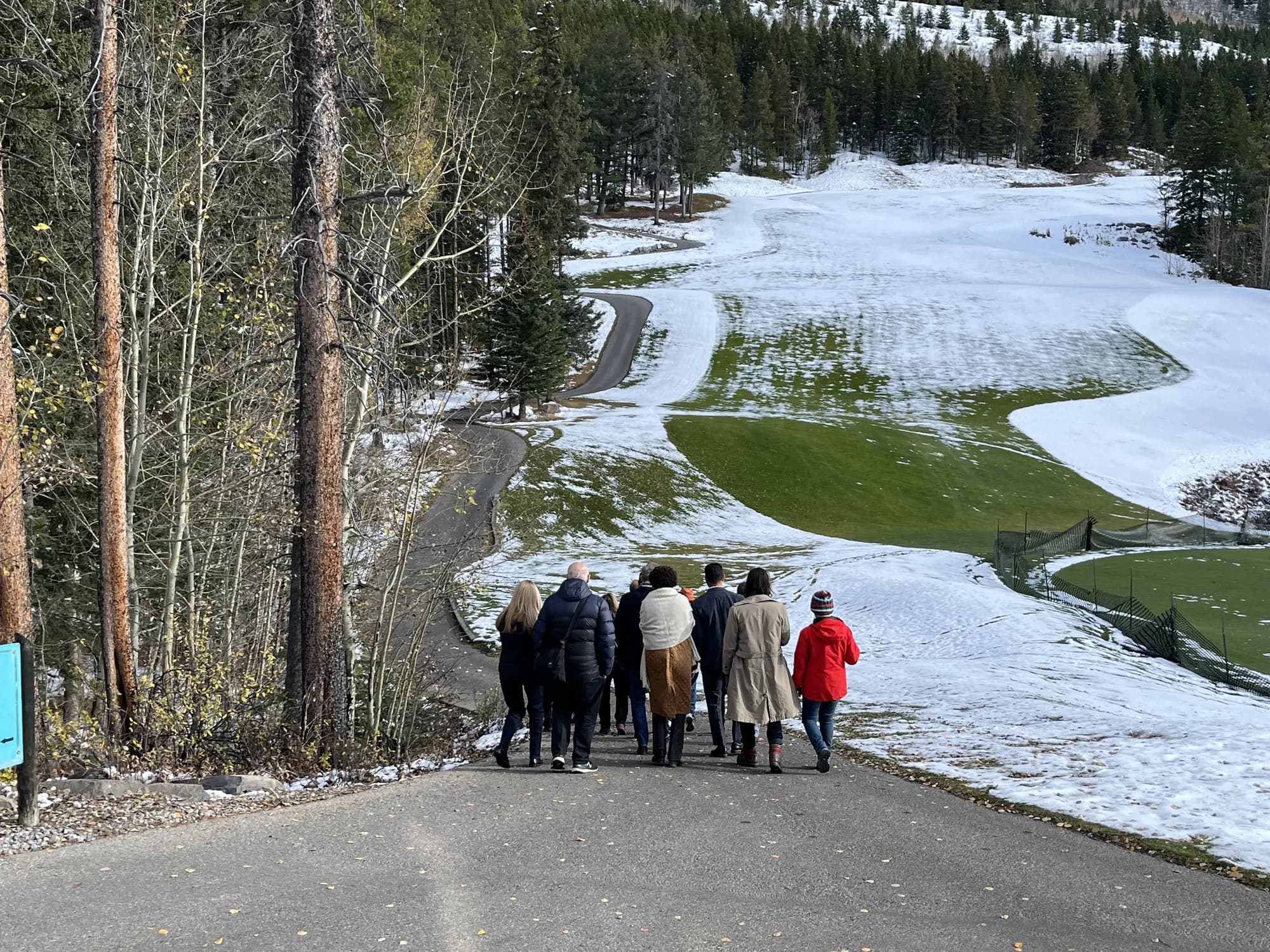 A Leadering workshop group walking together outdoors at a mountain retreat